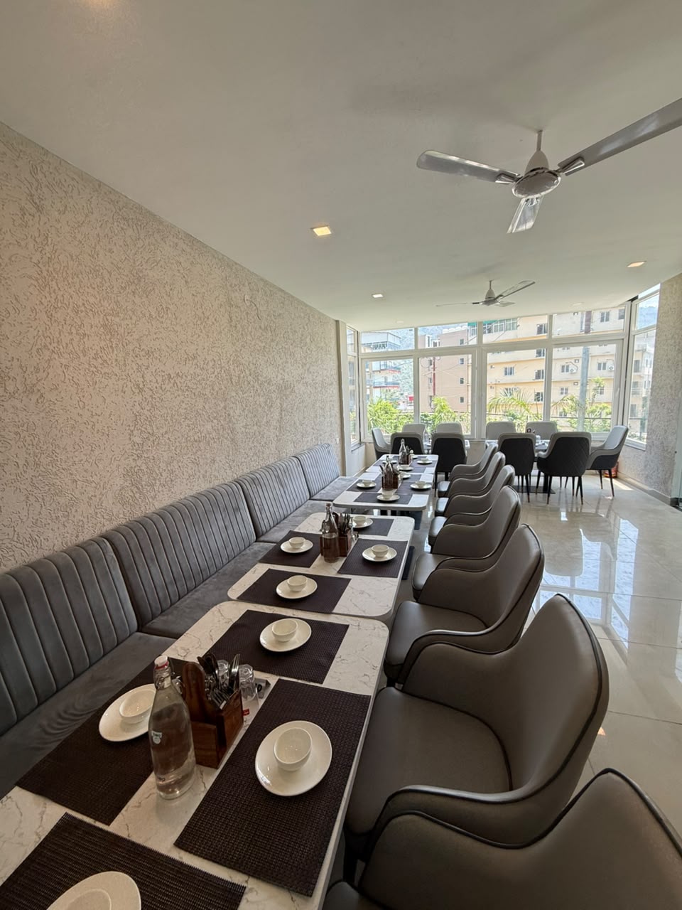 Dining hall with a banquette running the length of the room